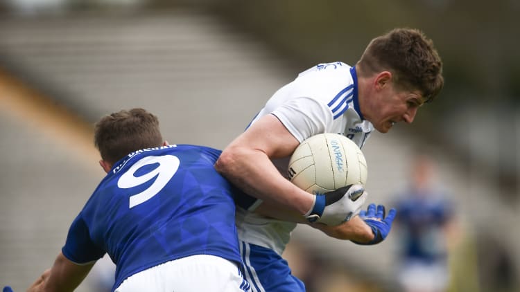 Darren Hughes, Monaghan, and Killian Clarke, Cavan, in Allianz Football League action at St Tiernach's Park.