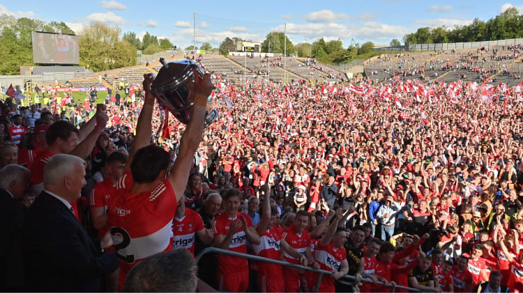 Derry captain Chrissy McKaigue lifts the trophy after his side's victory in the Ulster GAA Football Senior Championship Final between Derry and Donegal at St Tiernach's Park in Clones, Monaghan.