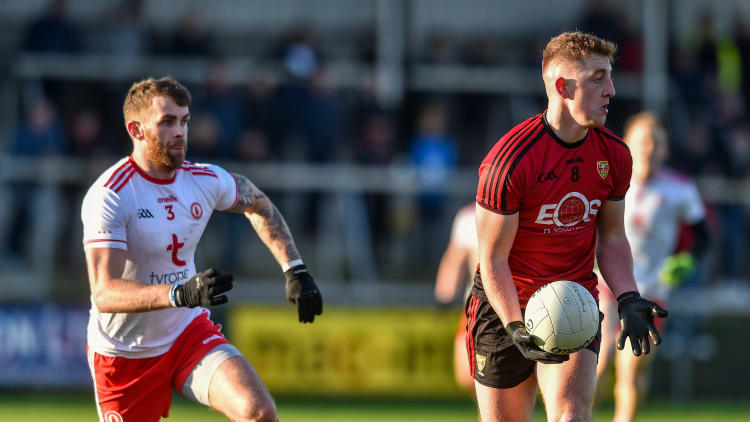 Sean Dornan of Down in action against Ronan McNamee of Tyrone during the Bank of Ireland Dr McKenna Cup Semi-Final match between Tyrone and Down at the Athletic Grounds in Armagh.