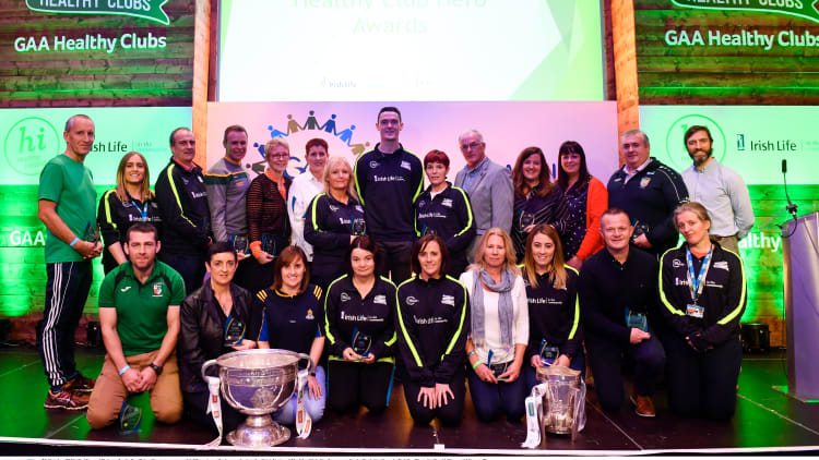 Dublin footballer Brian Fenton pictured with some of the 'Hero Award' winners at Croke Park.