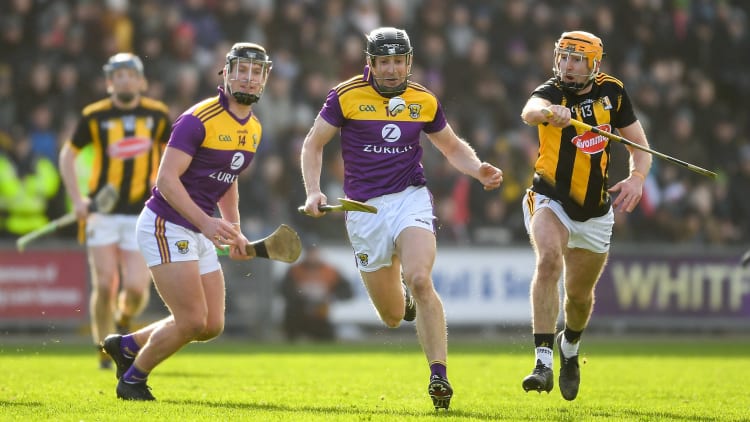Conor Dunbar of Wexford is tackled by John Donnelly of Kilkenny during the Allianz Hurling League Division 1 Group B Round 3 match between Wexford and Kilkenny at Chadwicks Wexford Park in Wexford.