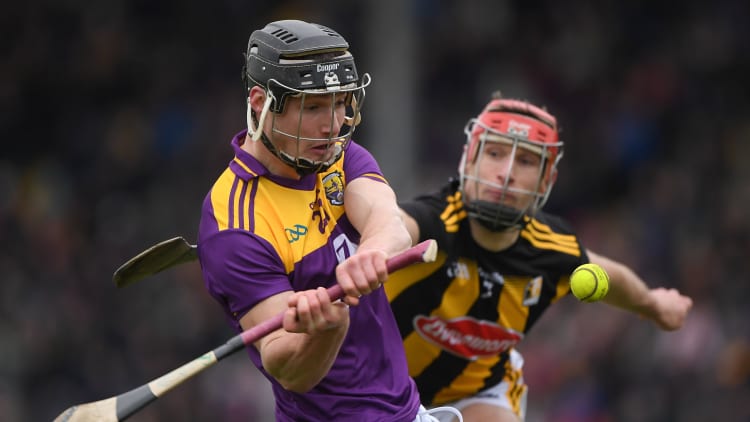 Mike Dwyer, Wexford, and Cillian Buckley, Kilkenny, in Walsh Cup action.