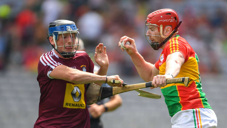 Edward Byrne of Carlow in action against Eoin Price of Westmeath during the 2018 Joe McDonagh Cup Final match between Westmeath and Carlow at Croke Park in Dublin.