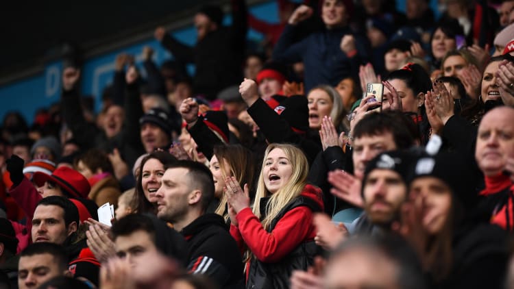 Supporters react during the AIB GAA Hurling All-Ireland Senior Club Championship Semi-Final match between Ballygunner, Waterford, and Slaughtneil, Derry, at Parnell Park in Dublin.