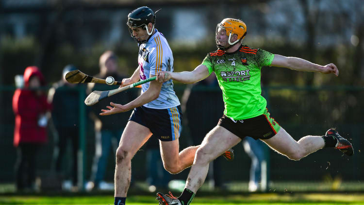 Ronan Hayes, UCD, and Podge Delaney, IT Carlow, in Electric Ireland Fitzgibbon Cup action at Belfield.