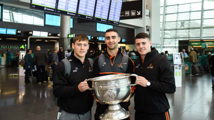Dublin players, from left, Con O'Callaghan, James McCarthy and Brian Howard with the Sam Maguire Cup at Dublin Airport prior to their departure to the GAA GPA PwC All Stars tour in Philadelphia, USA.