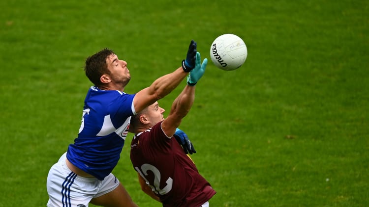 Colm Begley, Laois, and David Lynch, Westmeath, in Leinster Senior Football Championship action.
