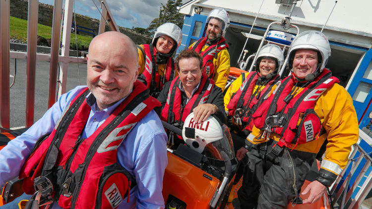 Marty Morrissey and Anthony Daly pictured with Kilrush RNLI lifeboat crew.