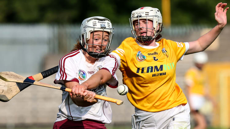 Antrim's Lucia McNaughton Antrim attempts to block Galway's Lisa Casserly in the 2021 All-Ireland Intermediate Camogie semi-final. Galway intermedaite semi-final 2021