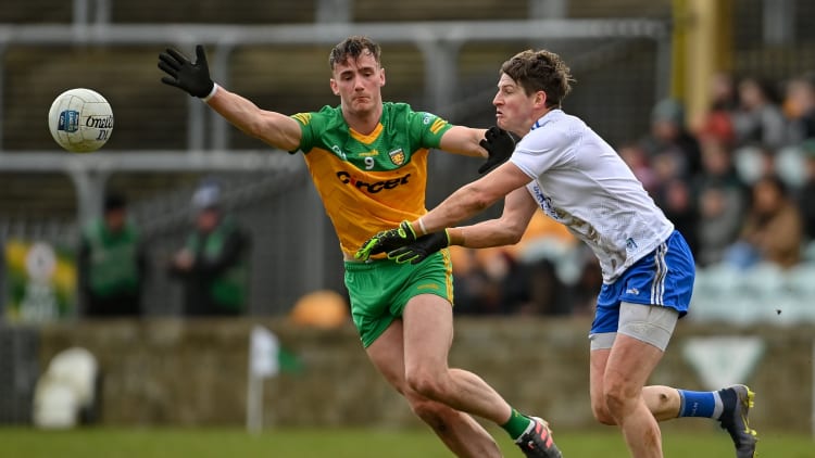 Darren Hughes, Monaghan, and Jason McGee, Donegal, in Allianz Football League action.