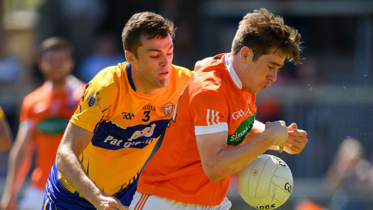 Andrew Murnin, Armagh, and Cillian Brennan, Clare, in All Ireland SFC Round Three Qualifier action at the Athletic Grounds.