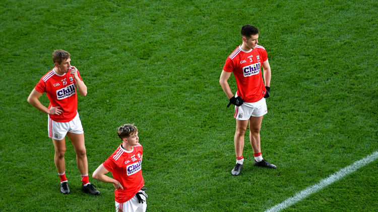 Dejected Cork players, left to right, Sean White, Cathail O’ Mahony, Brian Hurley, and Maurice Shanley after the Munster GAA Football Senior Championship Final match between Cork and Tipperary at Páirc Uí Chaoimh in Cork.