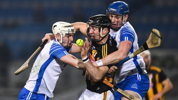 Conor Delaney of Kilkenny is surrounded by Dessie Hutchinson, left, and Austin Gleeson of Waterford during the 2021 GAA Hurling All-Ireland Senior Championship Semi-Final match between Kilkenny and Waterford at Croke Park in Dublin.