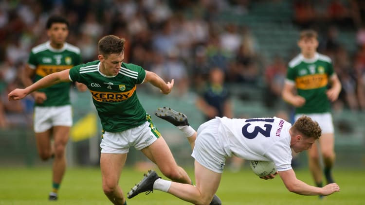 Jimmy Hyland, Kildare, and Michael Reidy, Kerry, in action at the Gaelic Grounds.