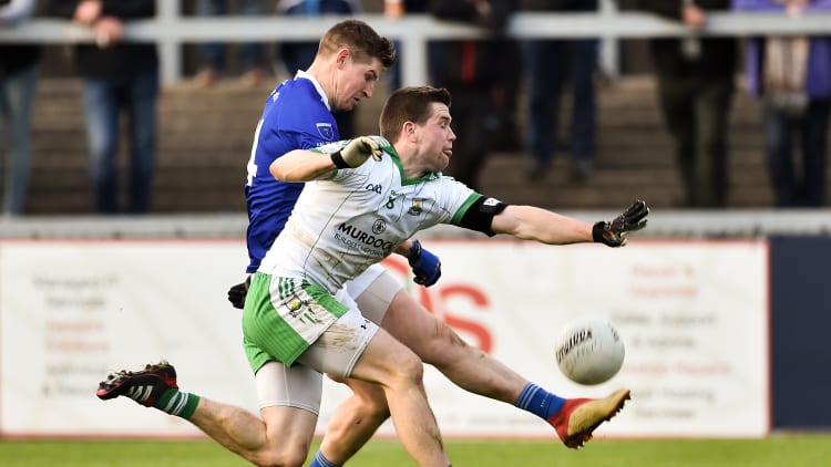 Scotstown's Darren Hughes on the attack against Burren.