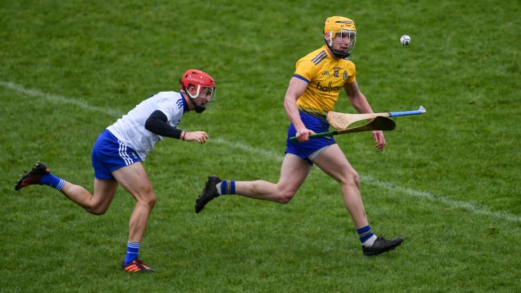 Padraig Kelly of Roscommon evades the tackle of Conor McKenna of Monaghan during the Allianz Hurling League Division 3A Round 2 match between Roscommon and Monaghan at Dr Hyde Park in Roscommon.