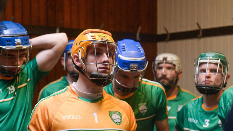 Ireland goalkeeper Enda Rowland and his team-mates in the dressing room before the 2017 Shinty International match between Ireland and Scotland at Bught Park in Inverness, Scotland.