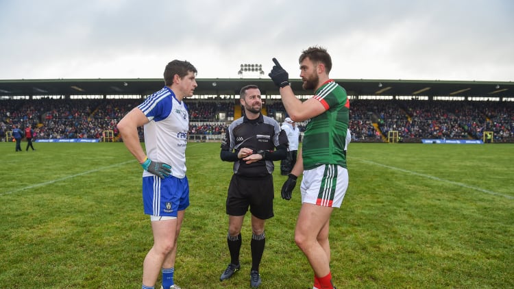 Darren Hughes, Monaghan, and Aidan O'Shea, Mayo, before the 2018 Allianz Football League Division One clash in Clones.