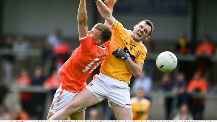 James Laverty, Antrim, and Rian O'Neill, Armagh, in Ulster SFC action.