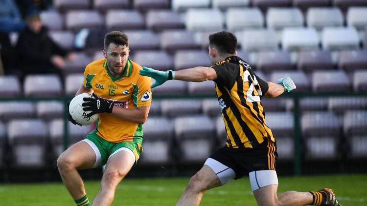 Micheal Lundy fisted a late equaliser for Corofin against Mountbellew-Moylough at Pearse Stadium.