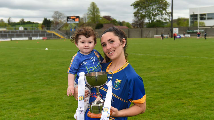 Lorna Fusciardi of Wicklow and her daughter Harley with the cup after the 2018 Lidl Ladies Football National League Division 4 Final match between Louth and Wicklow at St Brendan's Park, in Birr, Offaly.