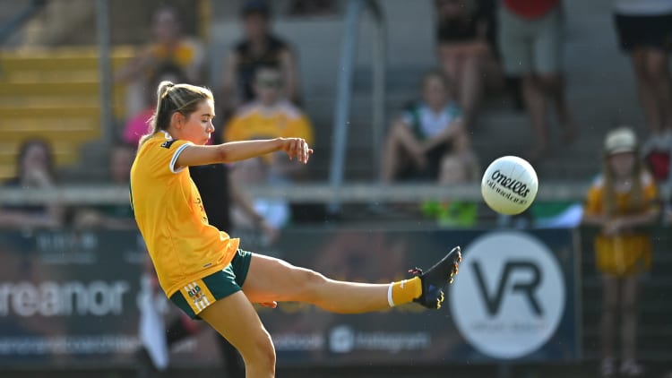 Caitlin Taggart kicks a point for Antrim at the Athletic Grounds.