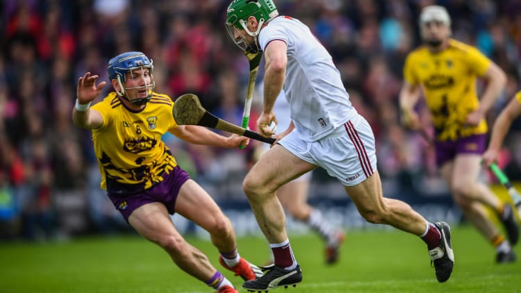 David Burke of Galway in action against Kevin Foley of Wexford during the Leinster GAA Hurling Senior Championship Round 3A match between Galway and Wexford at Pearse Stadium in Galway.