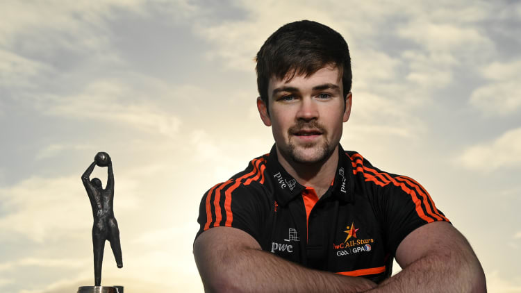 Cavan footballer, Thomas Galligan, pictured with his PwC GAA/GPA Footballer of the Month award for November.