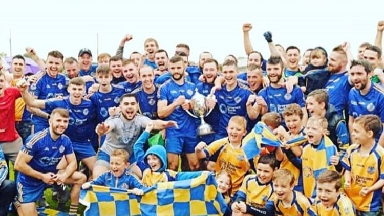 St Patrick's, Lisburn players and supporters celebrate after the club won the Antrim Junior Football Championship in 2019.