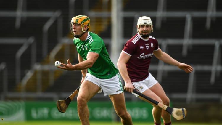 Dan Morrissey, Limerick, and Joe Canning, Galway, in Allianz Hurling League action at the LIT Gaelic Grounds.