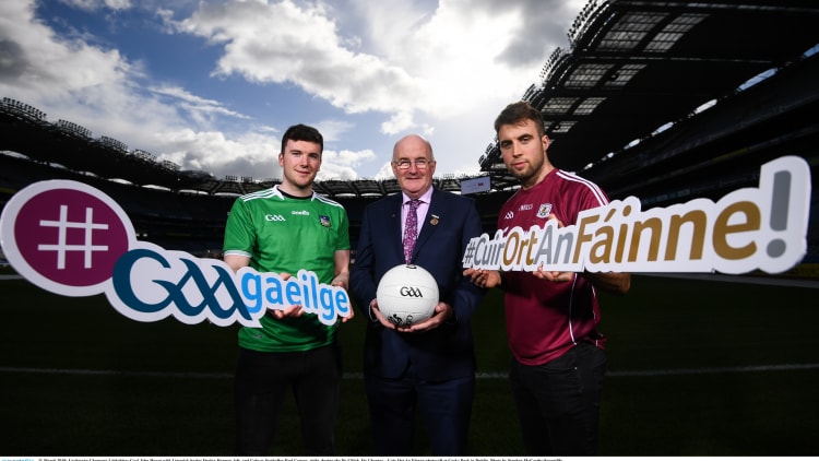 Uachtarán Chumann Lúthchleas Gael John Horan with Limerick hurler Declan Hannon, left, and Galway footballer Paul Conroy, right, during the Do Chlub, Do Chontae – Cuir Ort An Fáinne photocall at Croke Park in Dublin.