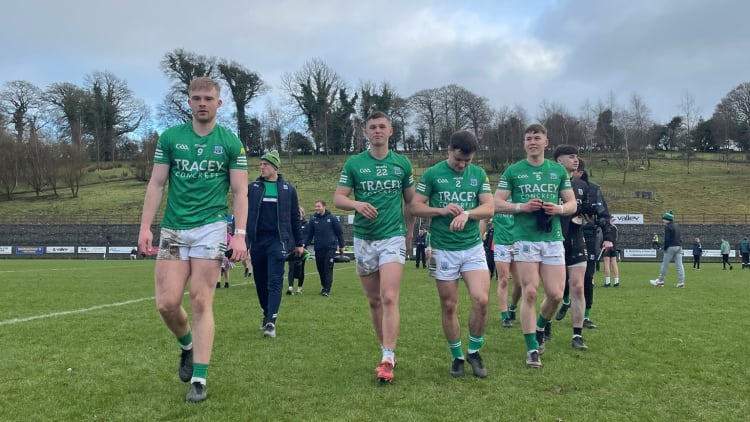 Fermanagh players walk off the pitch in Ederney after their win over Longford this afternoon.