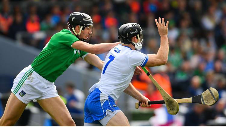 Gearoid Hegarty, Limerick, and Kevin Moran, Waterford, in 2019 Munster Senior Hurling Championship action at Walsh Park.