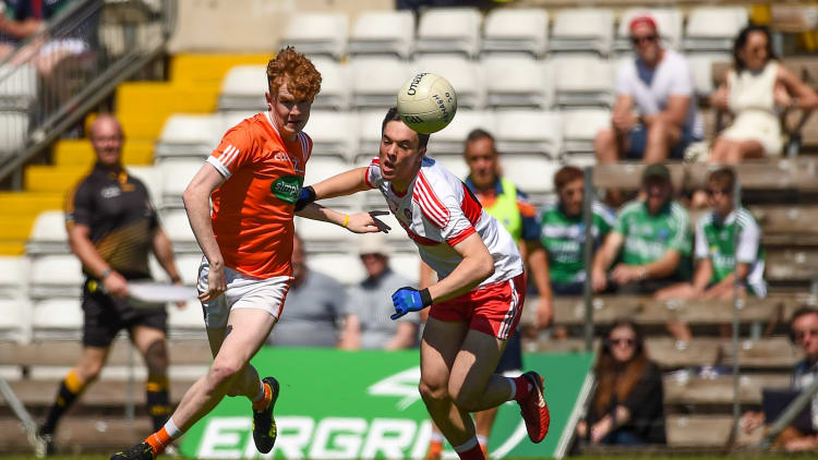 Conor Turbitt, Armagh, and Conor McCluskey, Derry, during the EirGrid Ulster 20 Final at St Tiernach's Park, Clones.