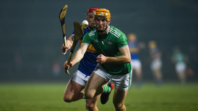 Richie English, Limerick, and Willie Connors, Tipperary, collide at the Gaelic Grounds.