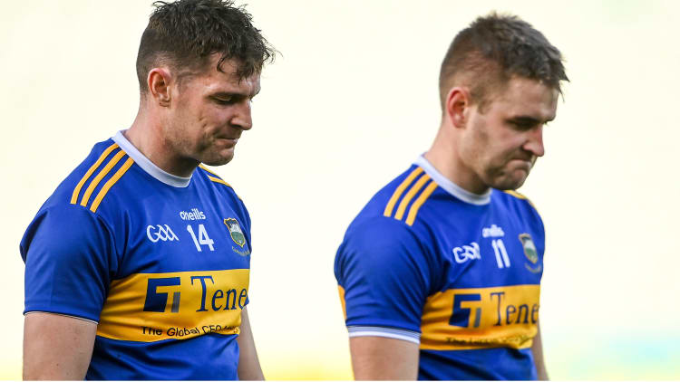 Tipperary players Séamus Callanan, left, and John McGrath leave the field dejected after the GAA Hurling All-Ireland Senior Championship Quarter-Final match between Galway and Tipperary at LIT Gaelic Grounds in Limerick.