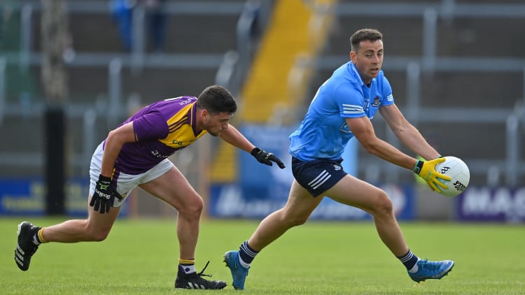 Cormac Costello, Dublin, and Liam O'Connor, Wexford, in Leinster Senior Football Championship action.