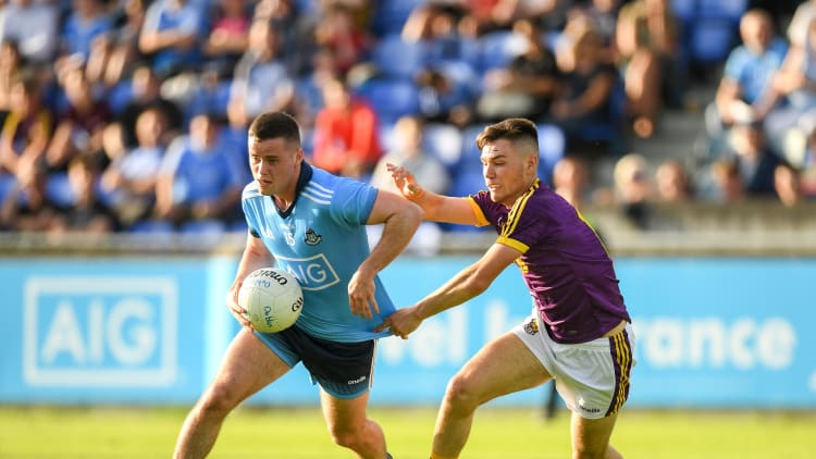 Dublin's Ross McGarry and Wexford's Ciaran Kavanagh in EirGrid Leinster Under 20 Football Championship action at Parnell Park.