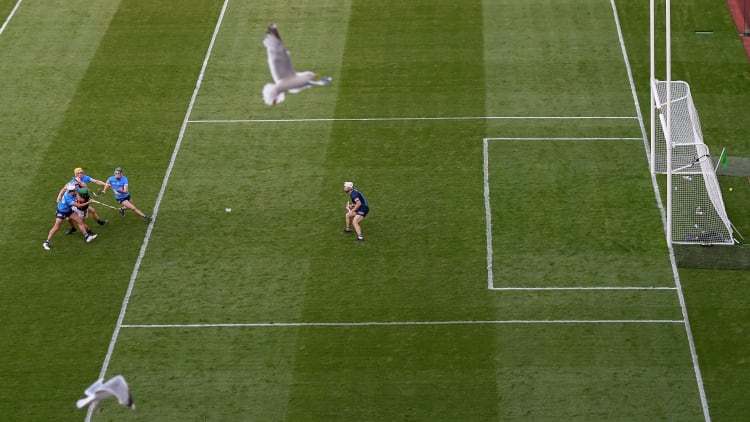 Alan Murphy of Kilkenny is tackled by Dublin players, from left, Jake Malone, Dáire Gray and James Madden, resulting in a penalty, during the 2021 Leinster GAA Senior Hurling Championship Final match between Dublin and Kilkenny at Croke Park in Dublin.