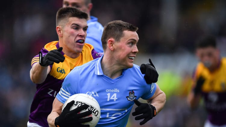 Con O'Callaghan, Dublin, and Eoin Porter, Wexford, in Leinster SFC action.