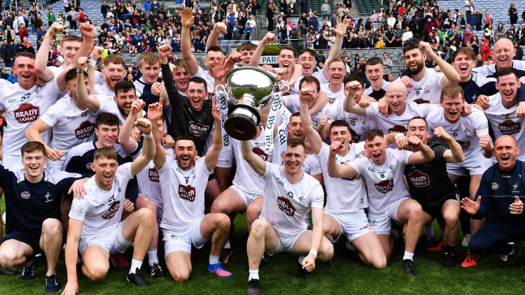 Kildare captain Brian Byrne lifts the Christy Ring Cup alongside his fellow players this evening at Croke Park.