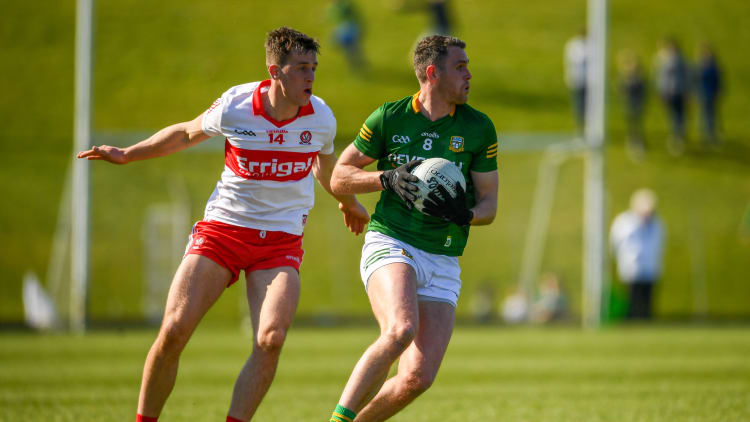 Bryan Menton, Meath and Shane McGuigan, Derry, in Allianz Football League action.