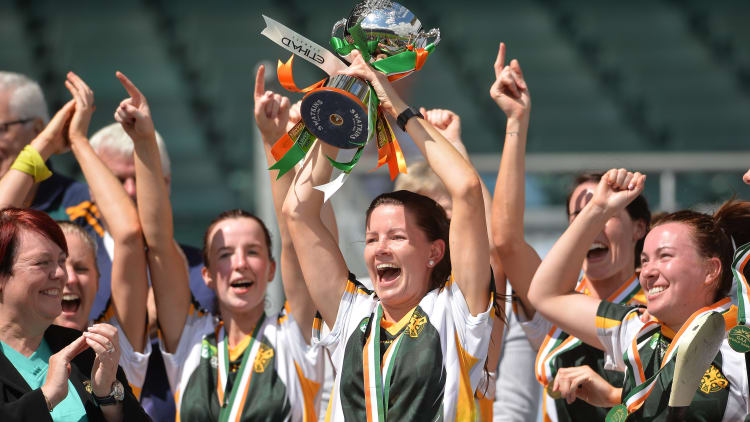 Keira Kinahan Murphy of Australaisa lifts the cup after victory in the GAA World Games Camogie Cup during Day 4 of the Etihad Airways GAA World Games 2016 at Croke Park in Dublin.