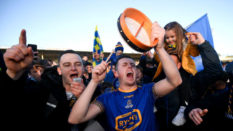 St Finbarr's supporters celebrate following the AIB Munster GAA Football Senior Club Championship Final match between Austin Stacks and St Finbarr's at Semple Stadium in Thurles, Tipperary.