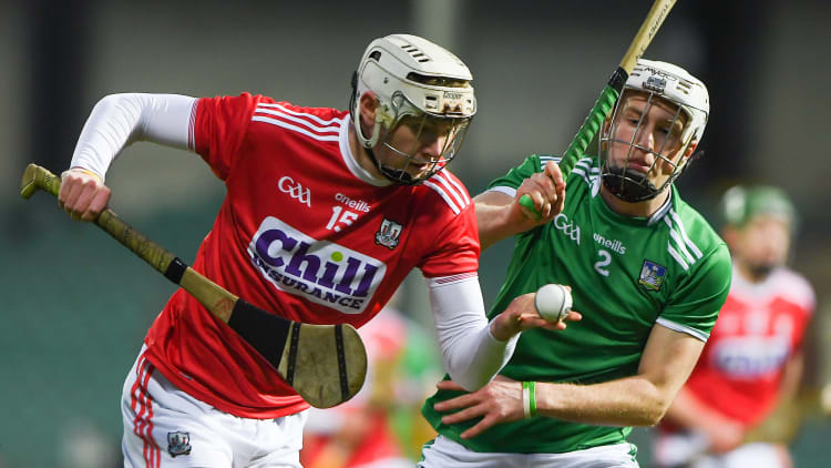 Shane Barrett of Cork in action against Jimmy Quilty of Limerick during the Bord Gáis Energy Munster GAA Hurling U20 Championship Semi-Final match between Limerick and Cork at LIT Gaelic Grounds in Limerick.