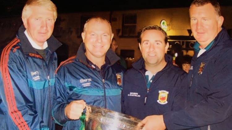 Left to right, Mayo Games Promotion Officer Eugene Lavin, Mayo Games Manager Billy McNicholas, Mayo Games Promotion Officer Eoin Sweeney, and Mayo Games Promotion Officer Martin Costello pictured with the Tom Markham Cup after Mayo's 2013 All-Ireland Minor Final win over Tyrone.