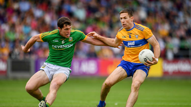 Gary Brennan, Meath, and Padraic Harnan, Meath, collide at O'Moore Park.