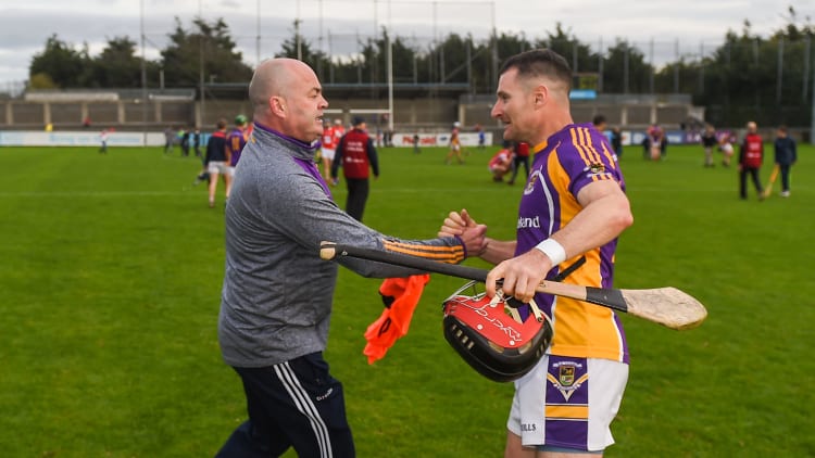 Kilmacud Crokes manager Anthony Daly celebrates with defender Niall Corcoran after victory over Cuala in the Dublin SHC semi-final.