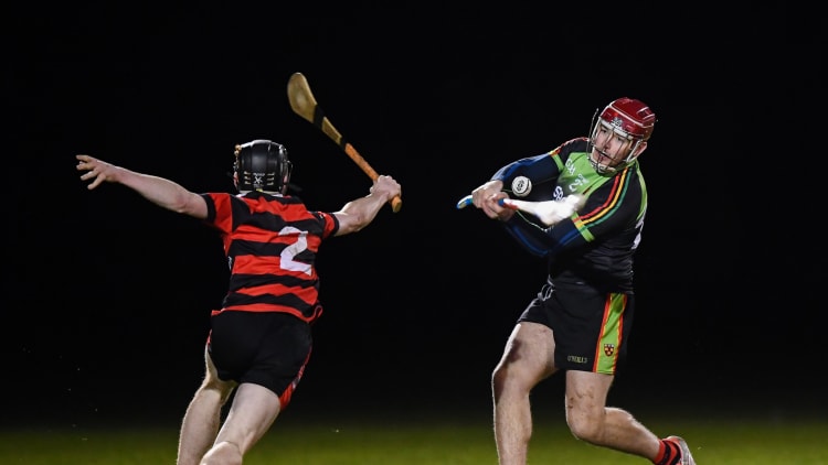 Jerry Kelly, IT Carlow, and Michael Conroy, Trinity College, in Electric Ireland Fitzgibbon Cup action.