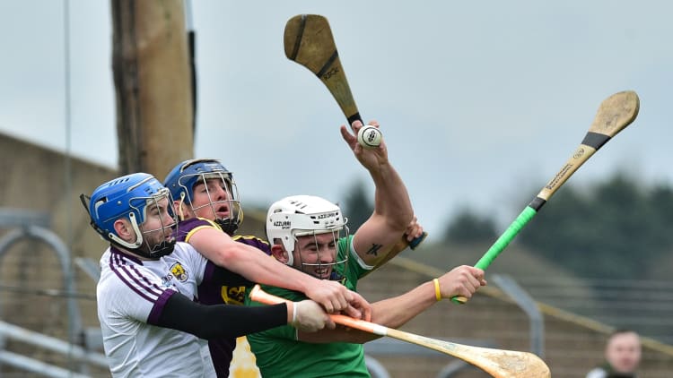 Aaron Gillane of Limerick in action against Shaun Murphy and Mark Fanning, left, of Wexford during the Allianz Hurling League Division 1A Round 1 match between Wexford and Limerick at Innovate Wexford Park in Wexford.